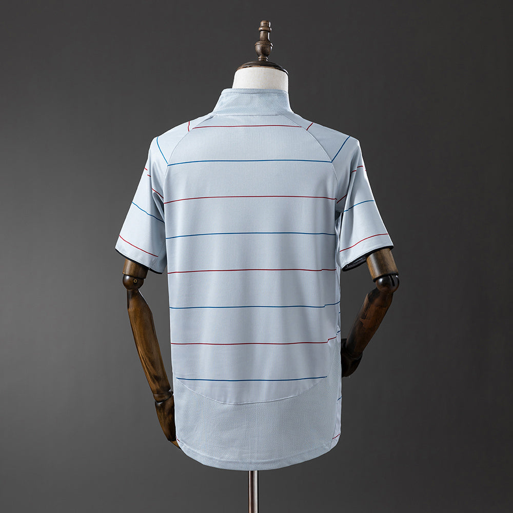 Camiseta retro FC Barcelona 2003/04 segunda equipación amarilla detalle escudo – Cortita y al Pie