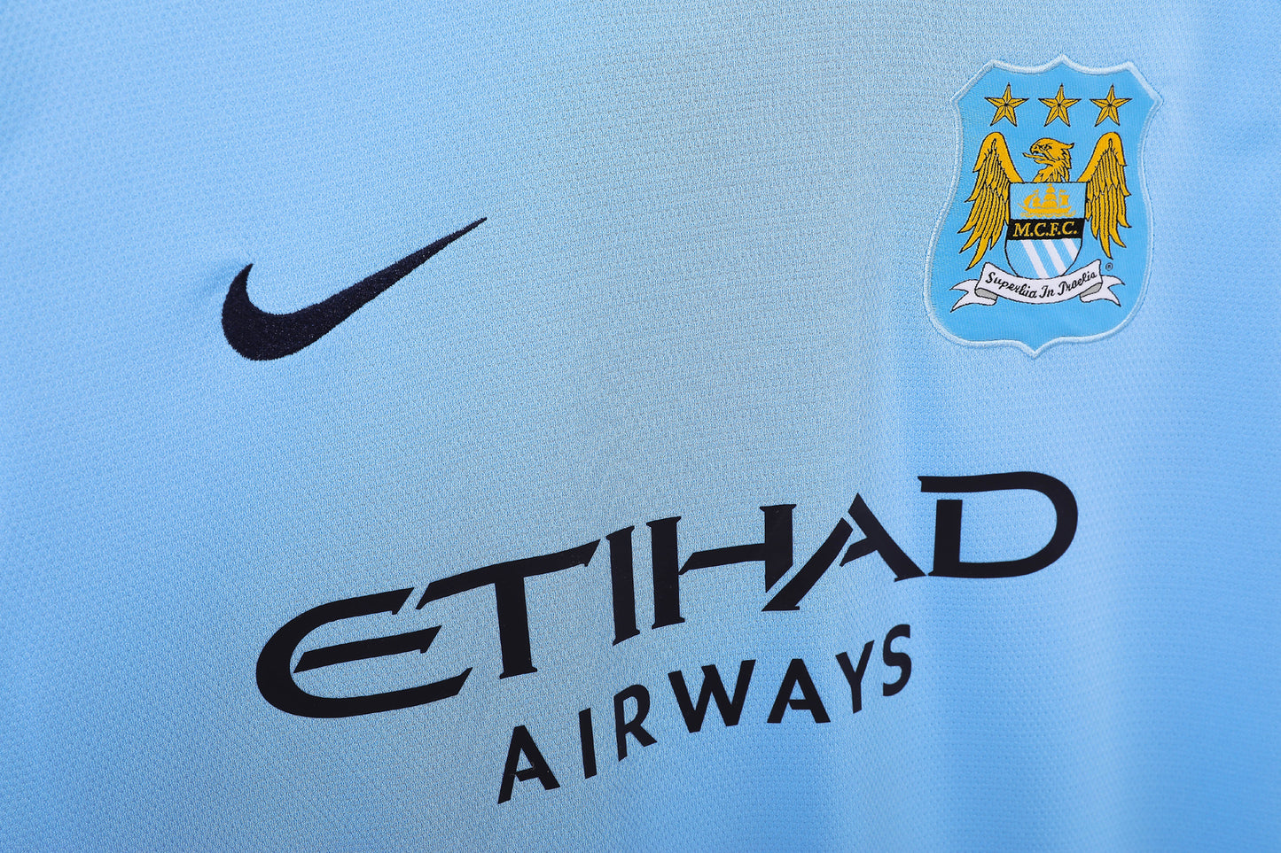 Camiseta retro Manchester City 2013/14 primera equipación lateral Etihad – Cortita y al Pie