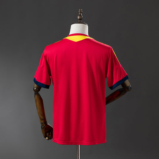 Camiseta retro España 2013 primera equipación detalle escudo RFEF – Cortita y al Pie