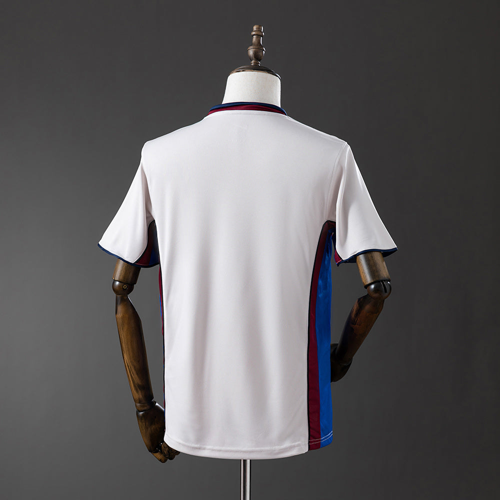Camiseta retro FC Barcelona 1998/99 segunda equipación amarilla detalle escudo – Cortita y al Pie