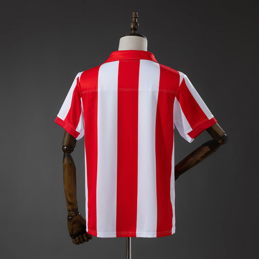 Camiseta retro Atlético de Madrid 2003/04 primera equipación detalle escudo Torres – Cortita y al Pie