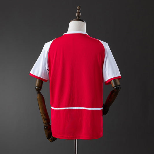 Camiseta retro Arsenal 2002/03 primera equipación detalle roja Highbury Wenger – Cortita y al Pie