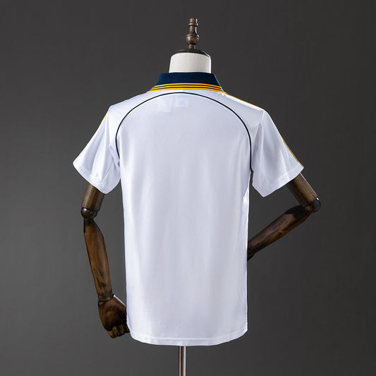 Camiseta retro Real Madrid 1998/99 primera equipación detalle año Centenario blanca – Cortita y al Pie