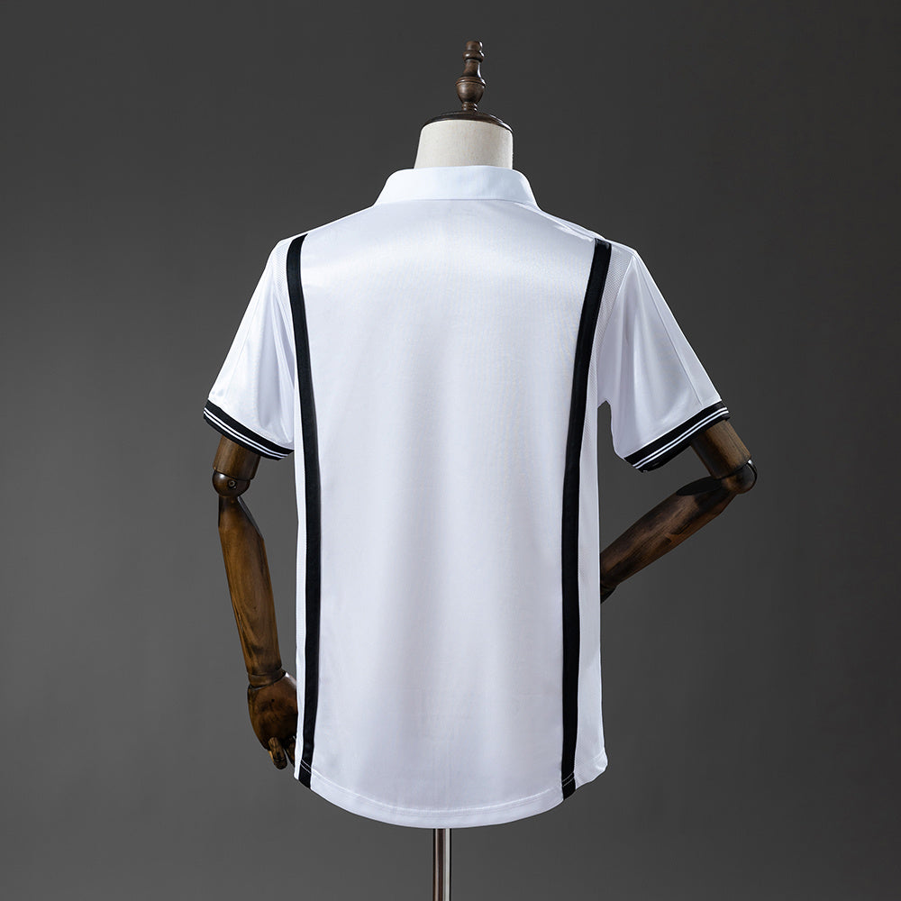 Camiseta retro Valencia CF 2000/01 primera equipación detalle escudo UCL Final – Cortita y al Pie