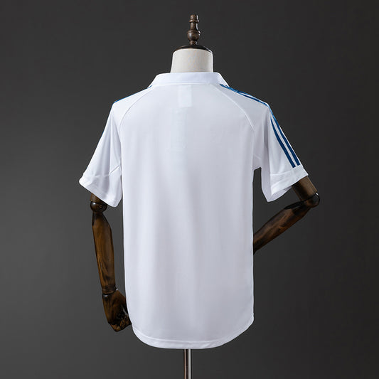 Camiseta retro Real Madrid 2001/02 primera equipación detalle escudo blanca – Cortita y al Pie