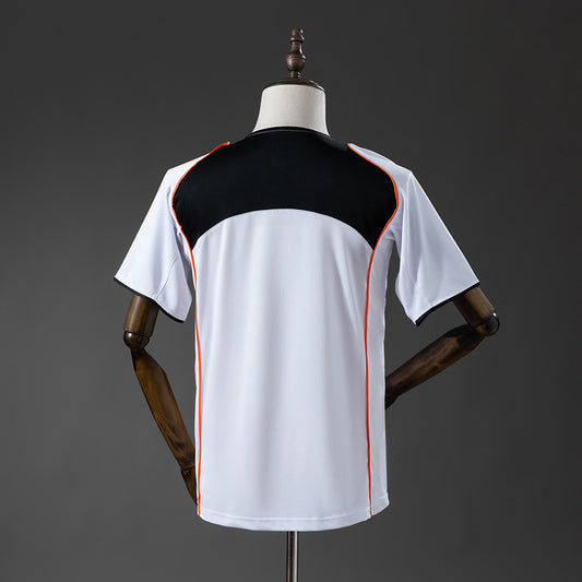 Camiseta retro Valencia CF 2004/05 primera equipación detalle escudo LaLiga – Cortita y al Pie