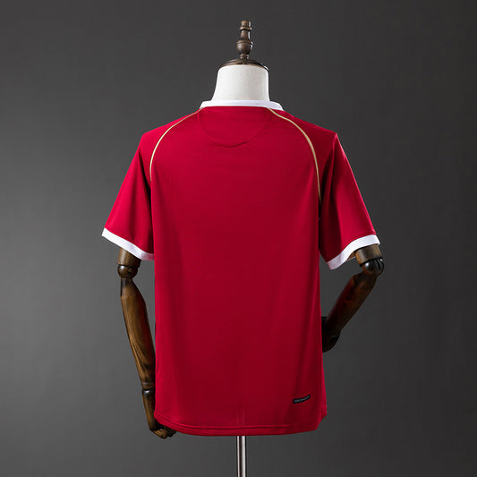 Camiseta retro Manchester United 2006/07 primera equipación detalle escudo Ronaldo – Cortita y al Pie