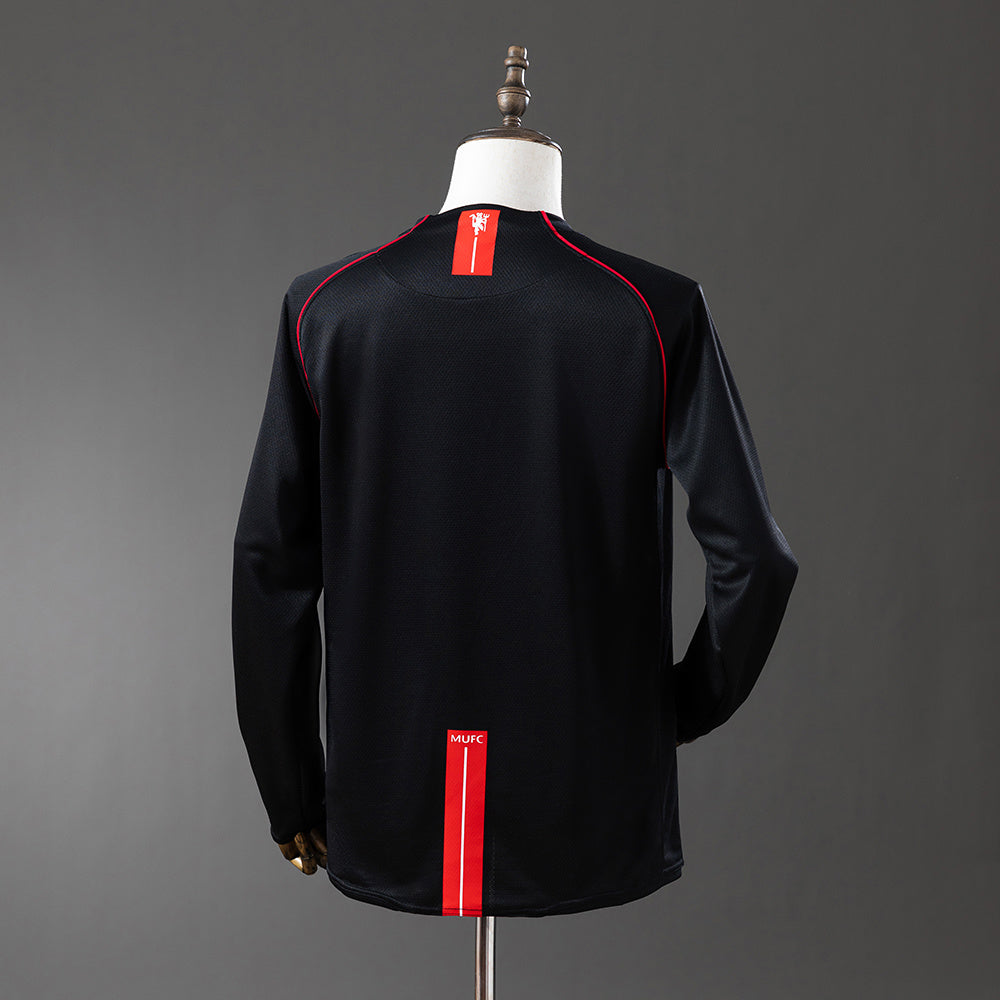 Camiseta retro Manchester United 2007/08 segunda equipación manga larga detalle UCL Moscú – Cortita y al Pie