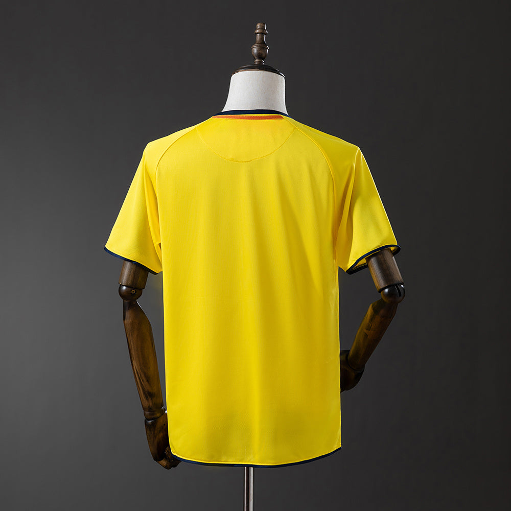 Camiseta retro FC Barcelona 2008/09 segunda equipación naranja detalle escudo – Cortita y al Pie