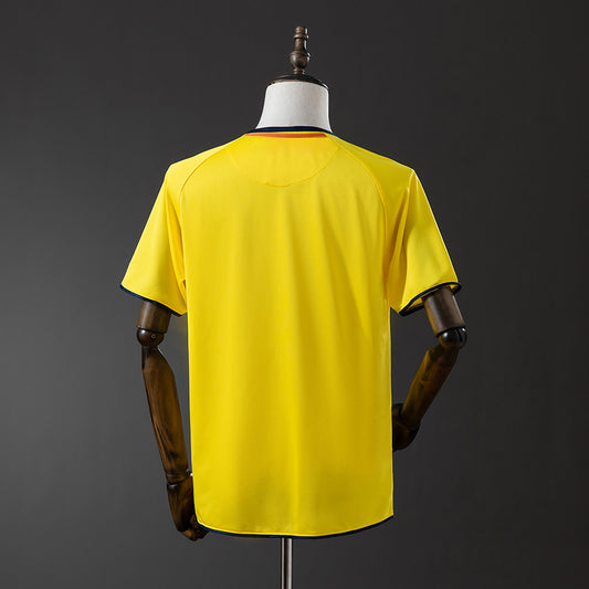 Camiseta retro FC Barcelona 2008/09 segunda equipación naranja detalle escudo – Cortita y al Pie