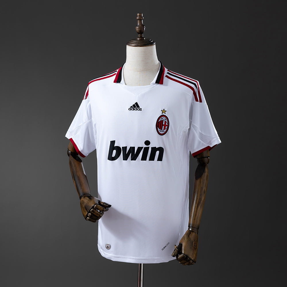 Camiseta retro AC Milan 2009/10 segunda equipación blanca Pirlo Ronaldinho – Cortita y al Pie