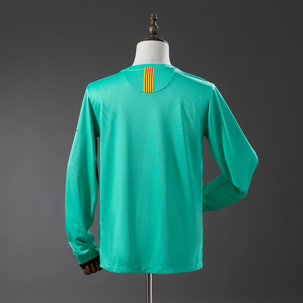 Camiseta retro FC Barcelona 2010/11 segunda equipación manga larga detalle – Cortita y al Pie
