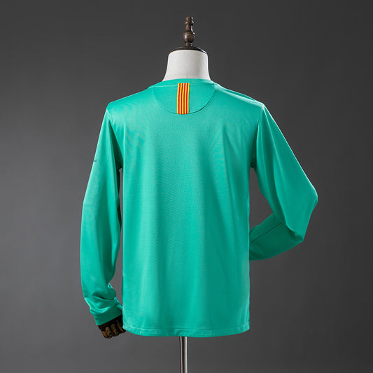 Camiseta retro FC Barcelona 2010/11 segunda equipación manga larga detalle – Cortita y al Pie