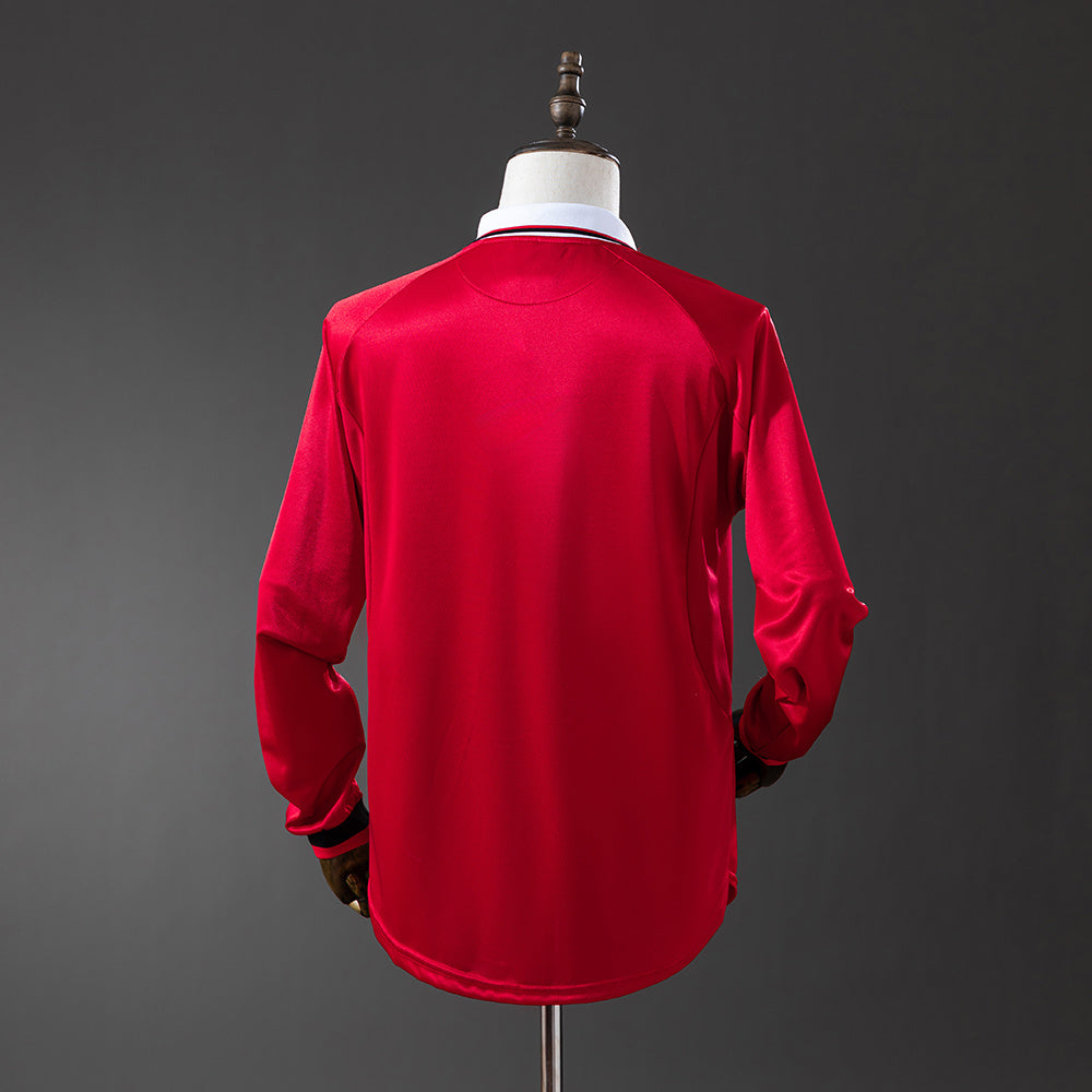 Camiseta retro Manchester United 1999/00 primera equipación manga larga detalle Treble – Cortita y al Pie