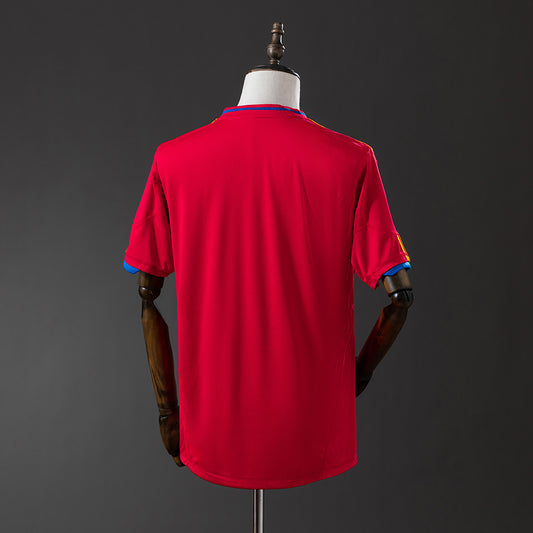 Camiseta retro España 2010 primera equipación detalle escudo RFEF campeón – Cortita y al Pie