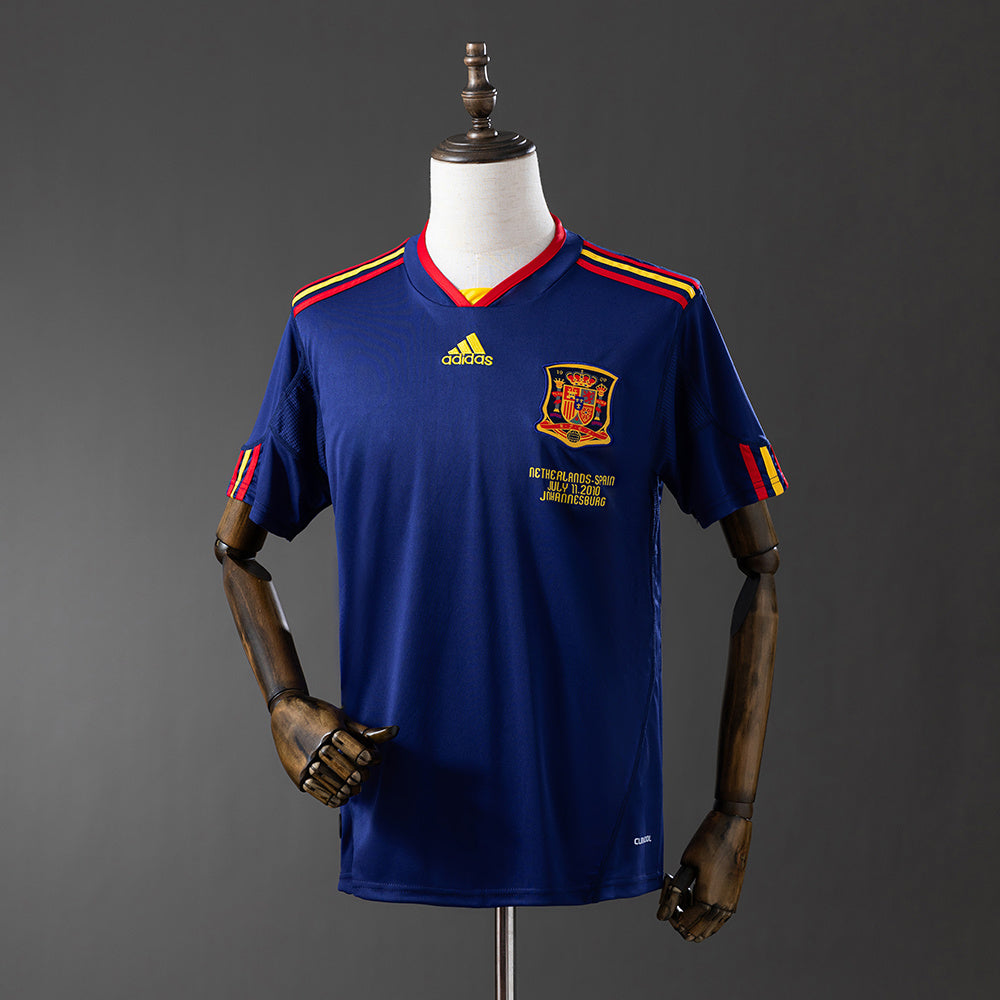 Camiseta retro España 2010 segunda equipación gol Iniesta Mundial Johannesburgo – Cortita y al Pie