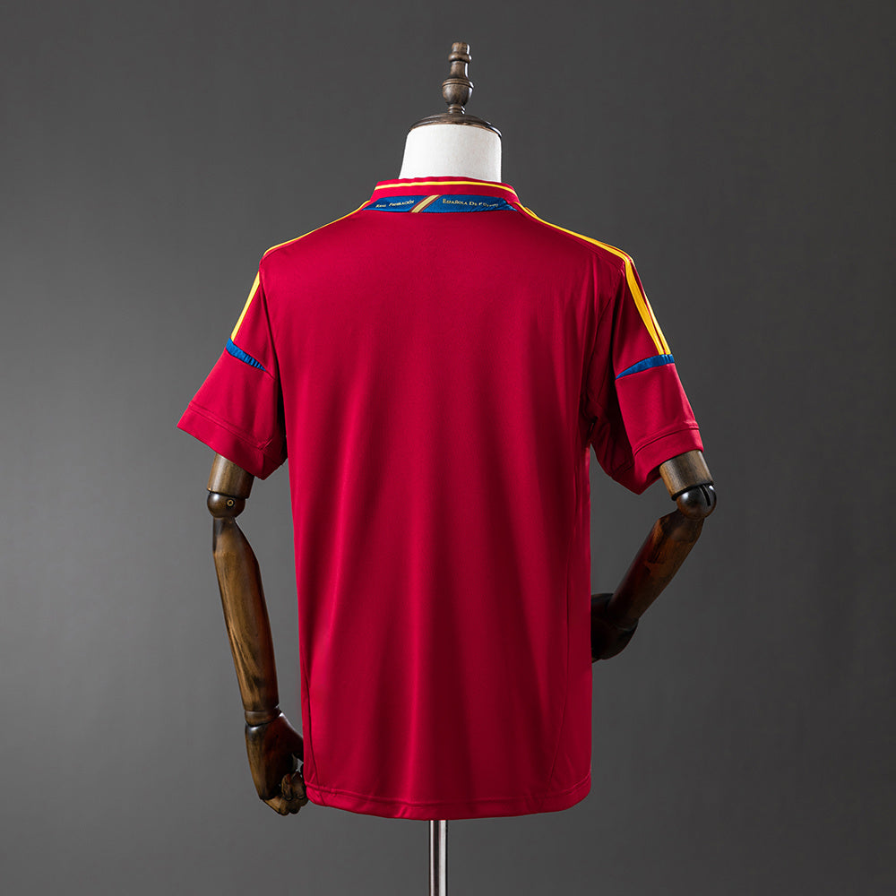 Camiseta retro España 2012 primera equipación detalle escudo RFEF triple corona – Cortita y al Pie