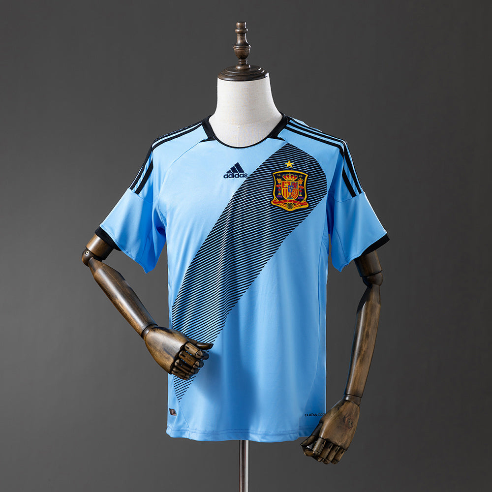 Camiseta retro España 2012 segunda equipación azul triple corona Iniesta Xavi – Cortita y al Pie