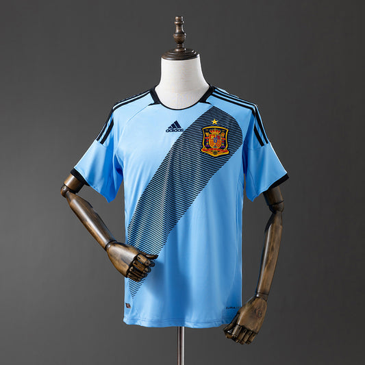 Camiseta retro España 2012 segunda equipación azul triple corona Iniesta Xavi – Cortita y al Pie