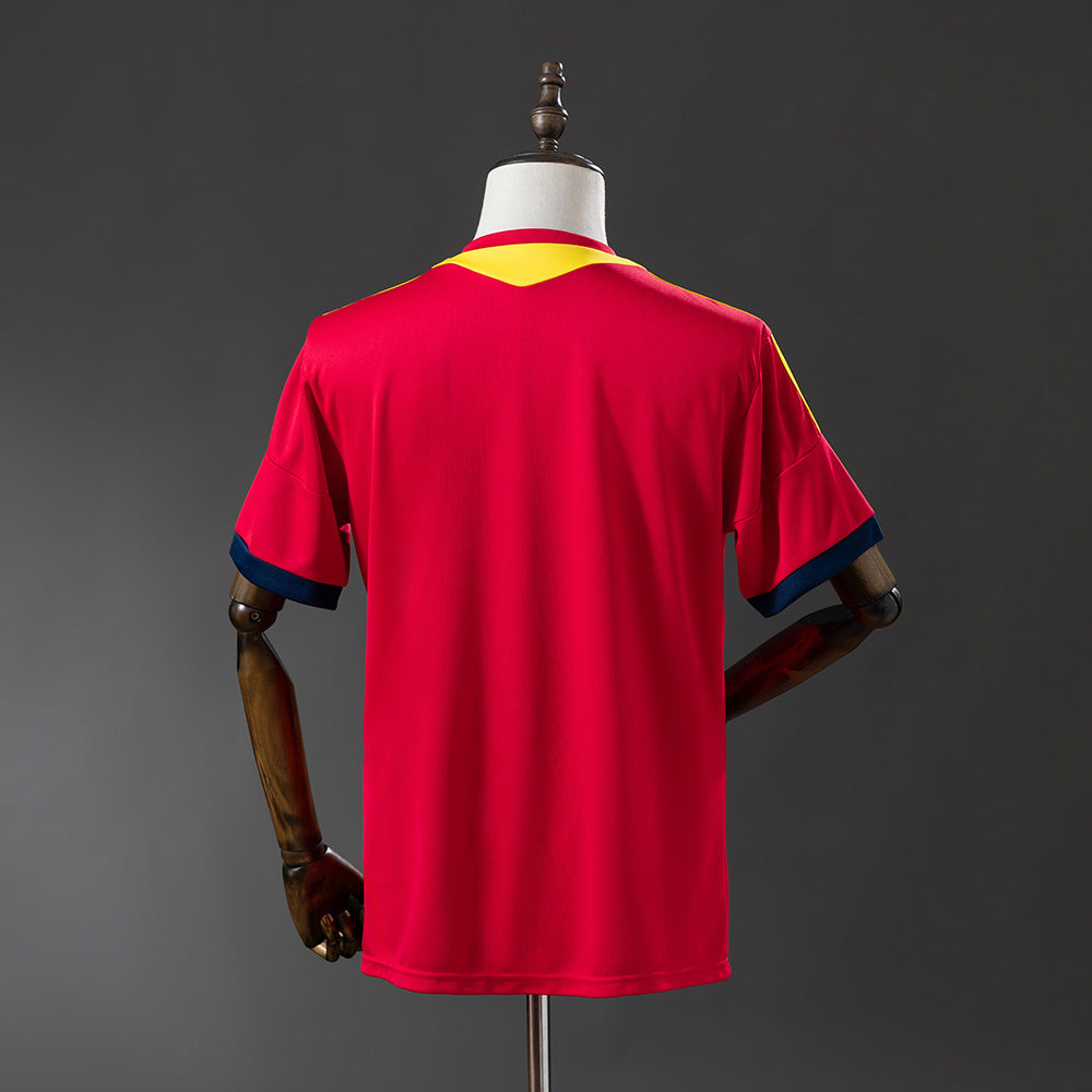 Camiseta retro España 2013 primera equipación detalle escudo RFEF – Cortita y al Pie