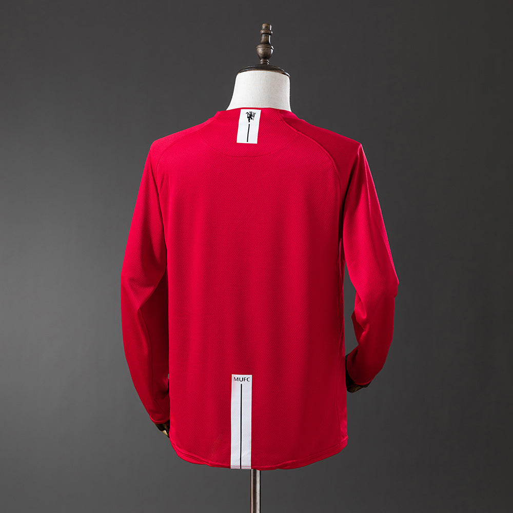 Camiseta retro Manchester United 2007/08 primera equipación manga larga detalle final – Cortita y al Pie