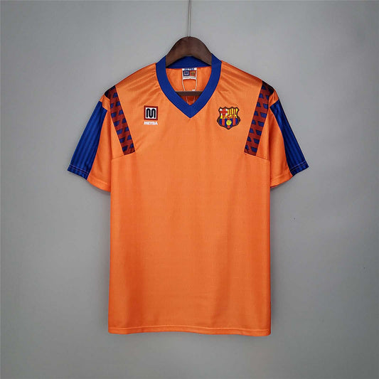 Camiseta retro Barcelona 1991/92 segunda equipación naranja Dream Team Cruyff – Cortita y al Pie