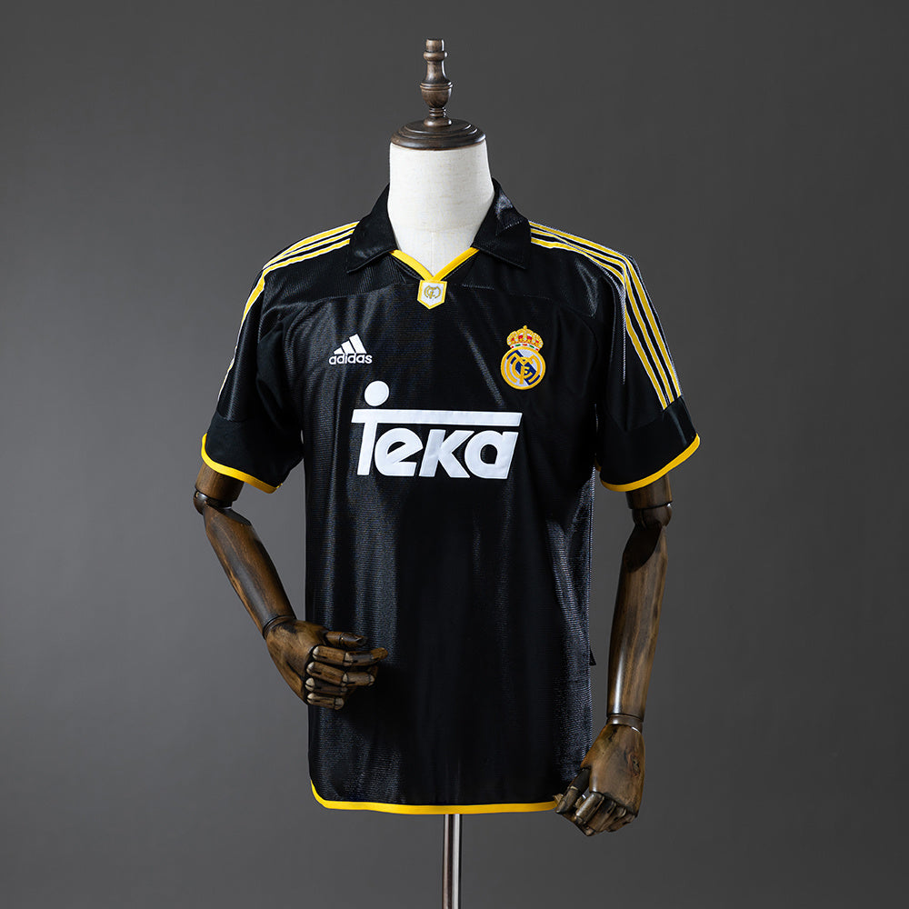 Camiseta retro Real Madrid 1998/99 segunda equipación morada Raúl Morientes – Cortita y al Pie