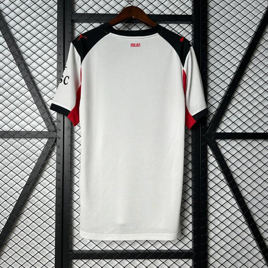 Camiseta AC Milan 2025/26 segunda equipación versión fan detalle escudo – Cortita y al Pie