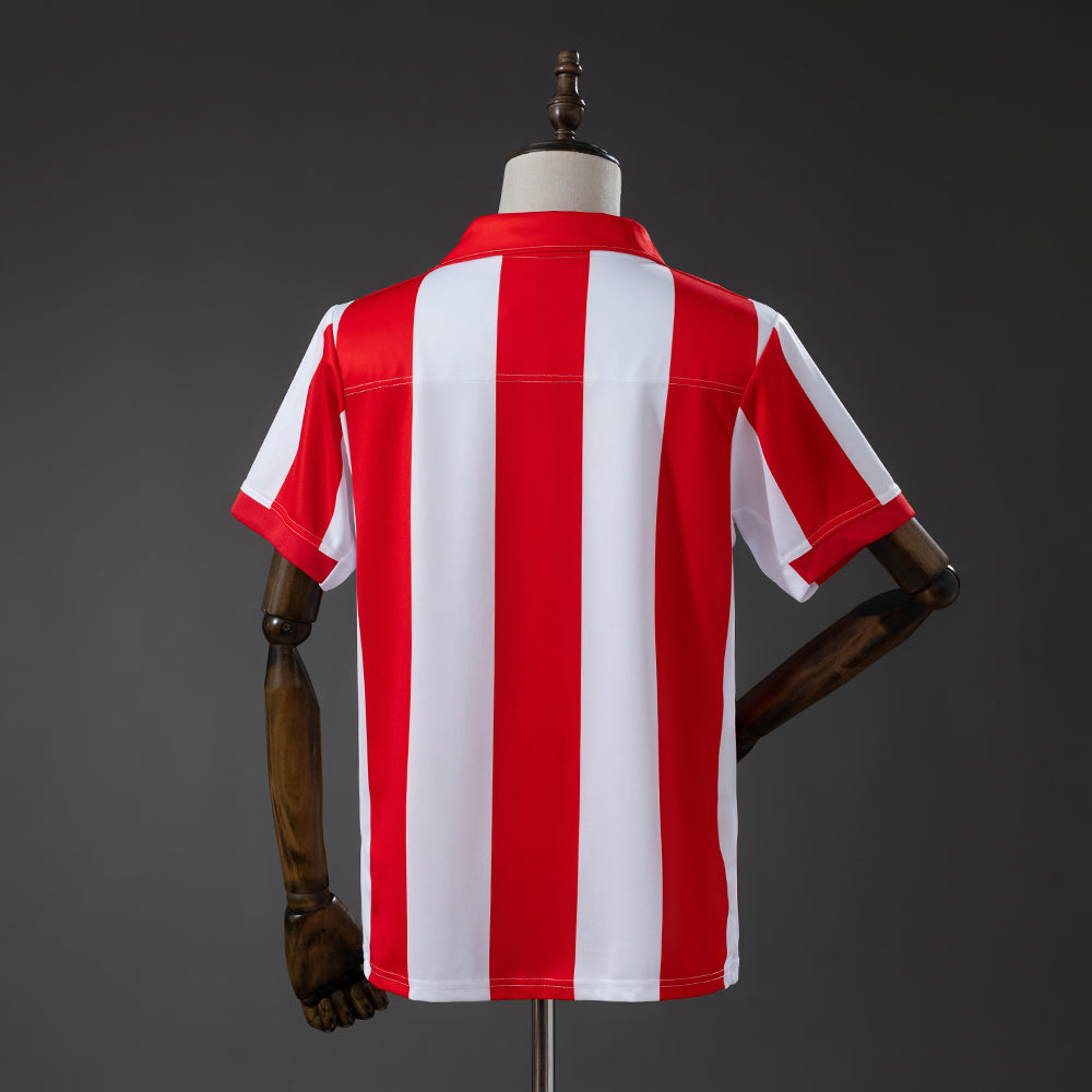 Camiseta retro Atlético de Madrid 2003/04 primera equipación detalle escudo Torres – Cortita y al Pie