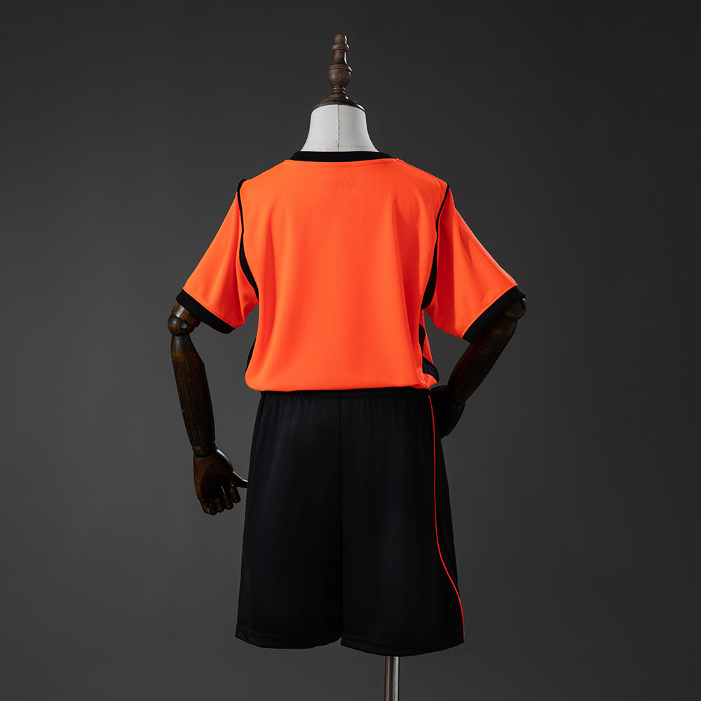 Camiseta Países Bajos Mundial 2026 primera equipación versión niño detalle escudo – Cortita y al Pie