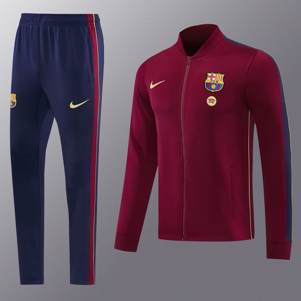 Chándal Barcelona 2026/27 Granate chaqueta y pantalón - vista frontal con escudo del Barça