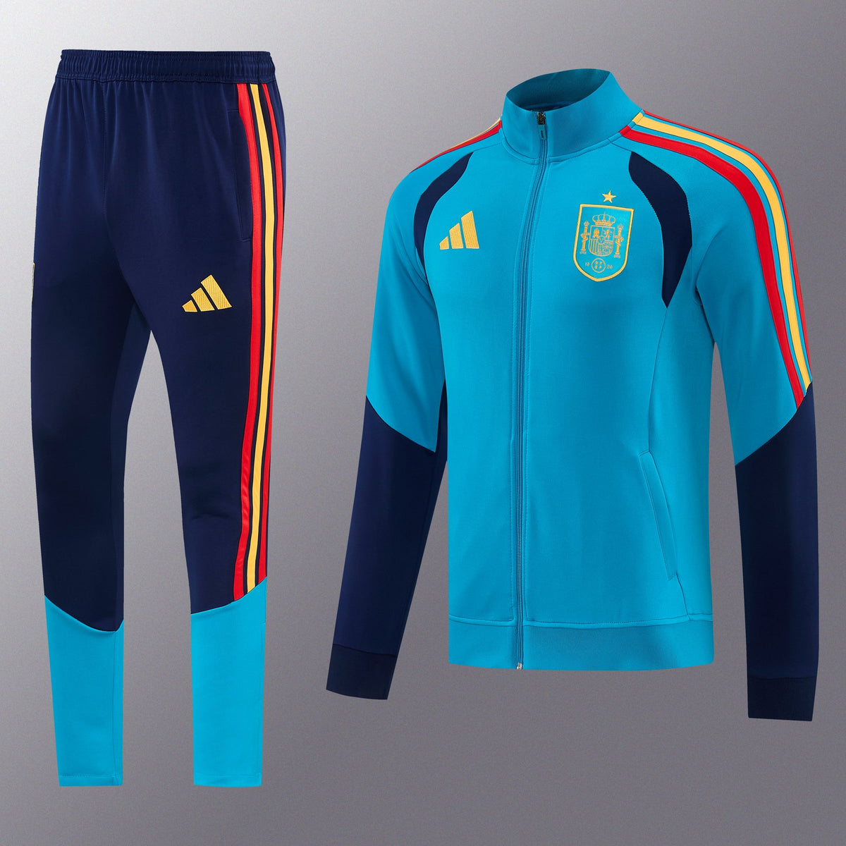 Chándal España 2026/27 Azul Claro chaqueta y pantalón - vista frontal con escudo de España