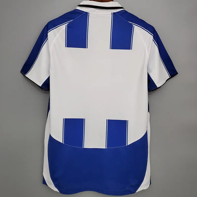 Camiseta retro Porto 2003/04 primera equipación detalle escudo Champions – Cortita y al Pie